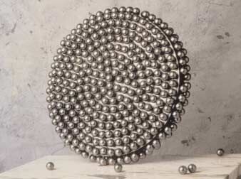 Disc of Spheres, 1985, steel and marble, 53.3 x 71.1 x 40.6 cm. Collection of Kurt Gutfreund, Chicago, IL, USA