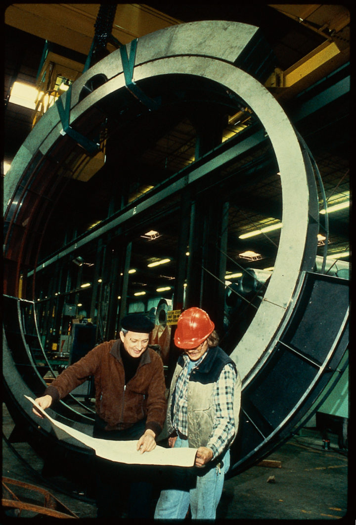 Being Born fabrication. Ferrari reviews the welding process with an employee of Quality Steel Company. Chicago, IL, USA, 1983. Personal photograph.