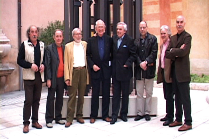 Ferrari with artists Ricardo Cassini, Silvano Girardello, Giorgio Olivieri, Giorgio Cortenova, Mario Colognese, Novello Finotti, and Igino Legnaghi